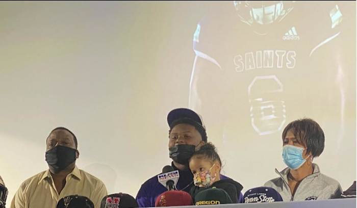 Gracen Halton sits with his family prior to committing to Oregon.